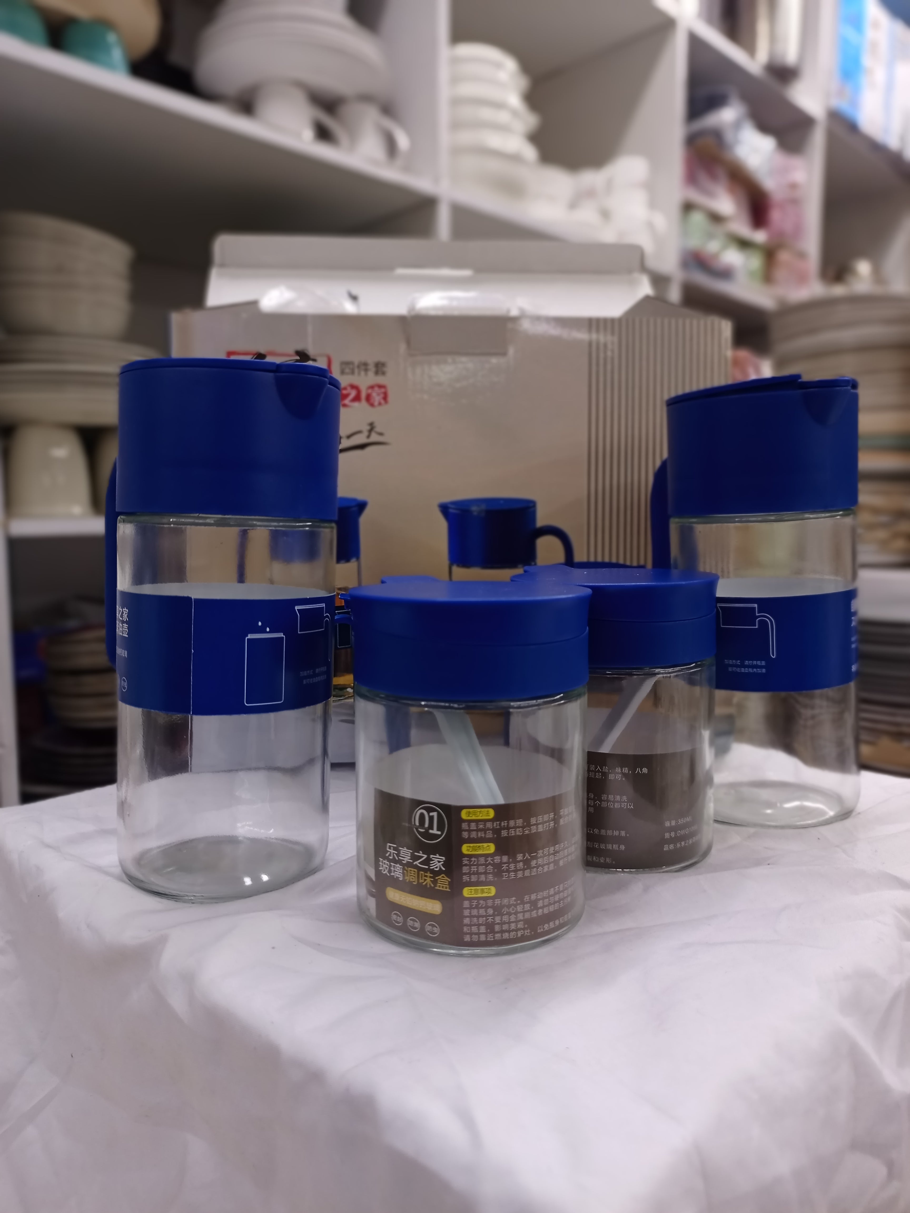 4-Piece Glass Oil and Spice Jar Set with Blue Lids & Spoons