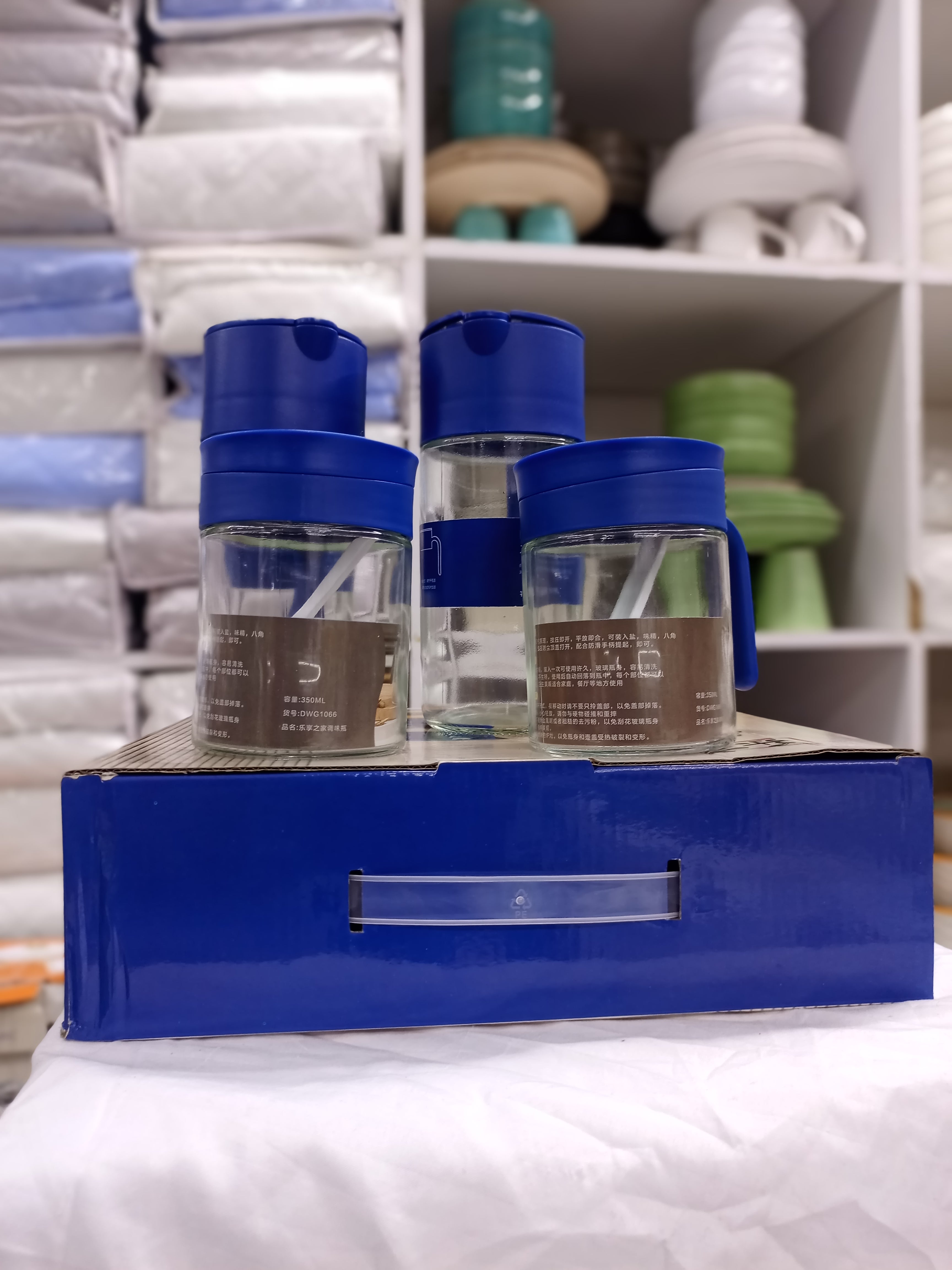 4-Piece Glass Oil and Spice Jar Set with Blue Lids & Spoons