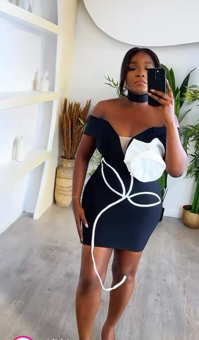 603 The "Floral Silhouette" Off-Shoulder Mini Dress