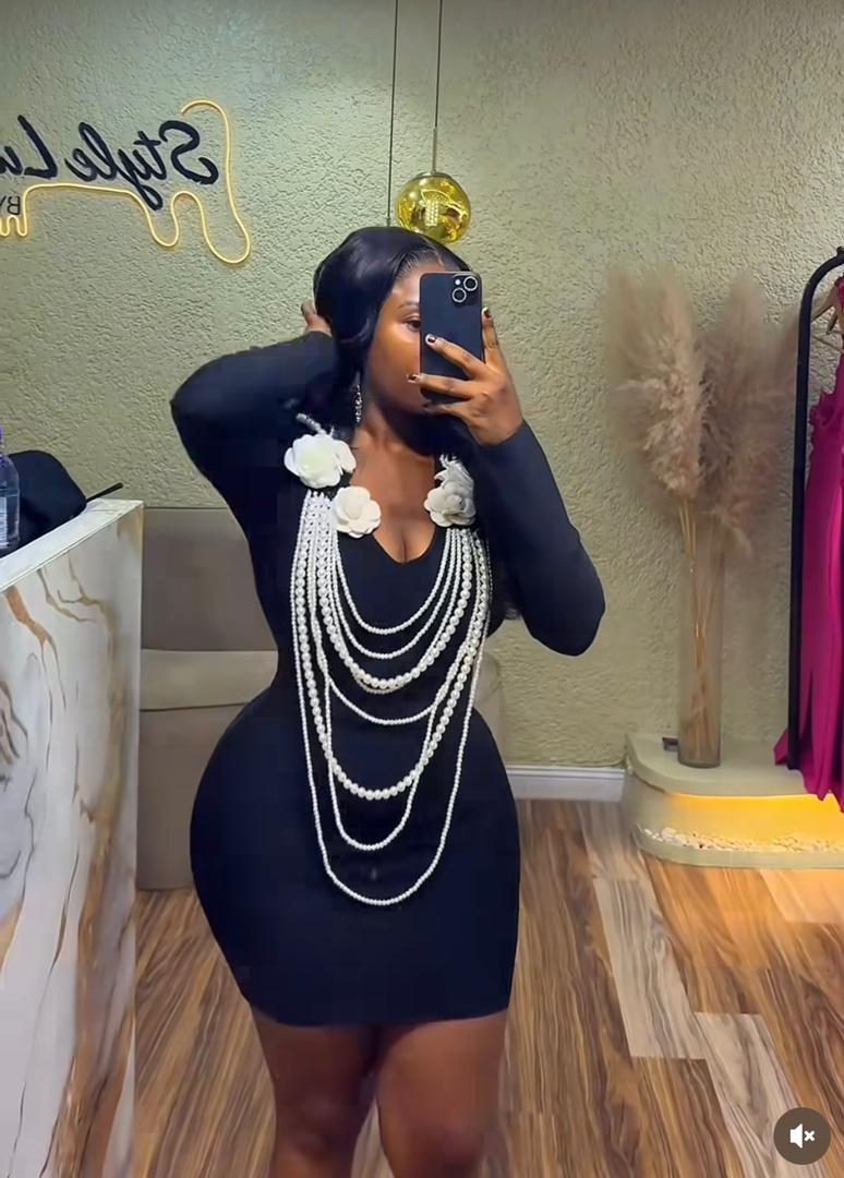 545 Sleeveless Dress With White Floral Appliques